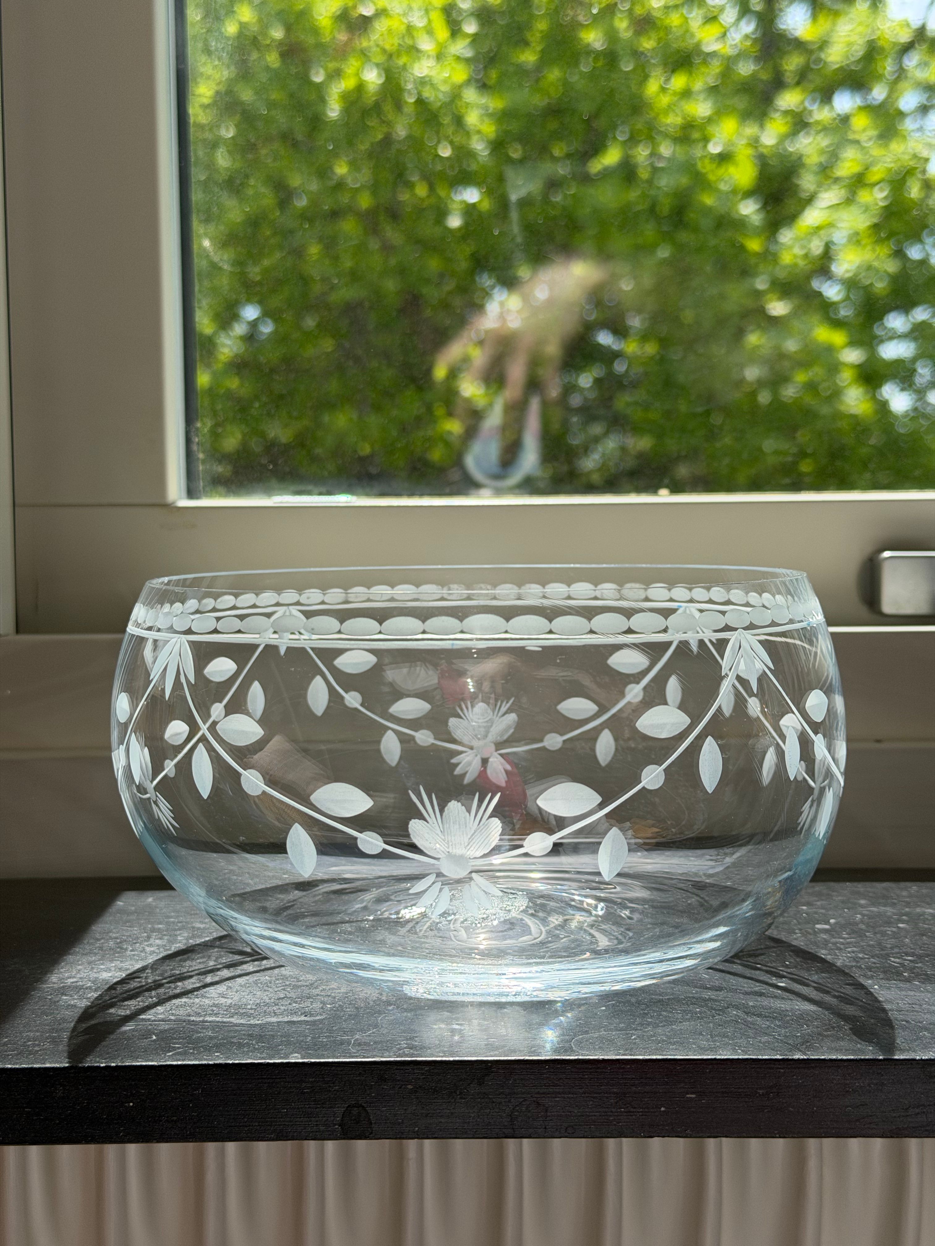 Garland engraving detail in clear glass